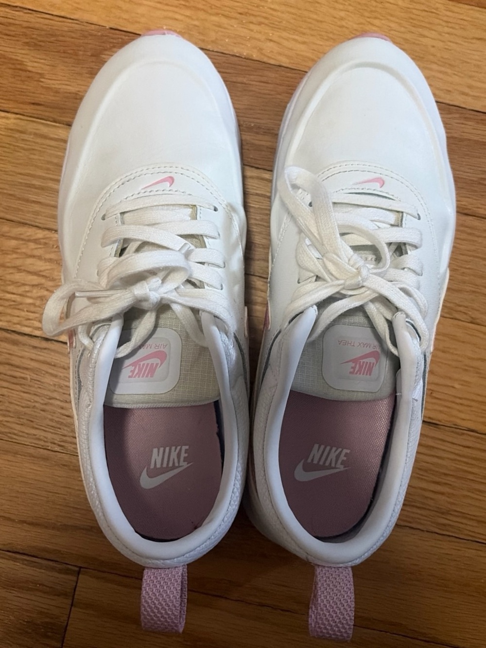 Nike White Sneakers with Pink Insoles and Accents